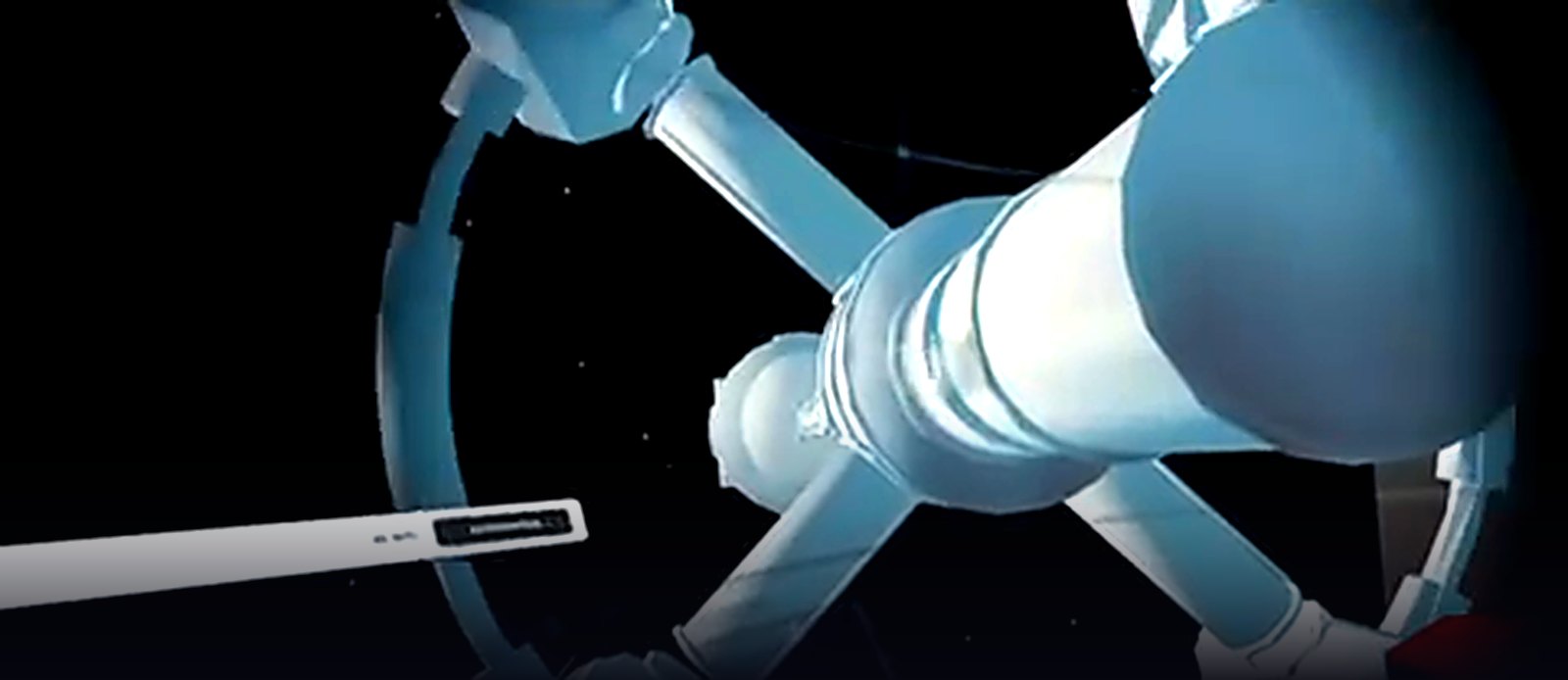 In-engine capture: an orbital station against black space — a ring truss, a pressurised module and a robotic arm lit hard from one side, with an instruction panel floating alongside it.