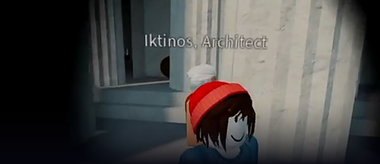 In-engine capture: a learner stands among the fluted columns of the intact Parthenon, facing an NPC whose name floats above him reading Iktinos, Architect.